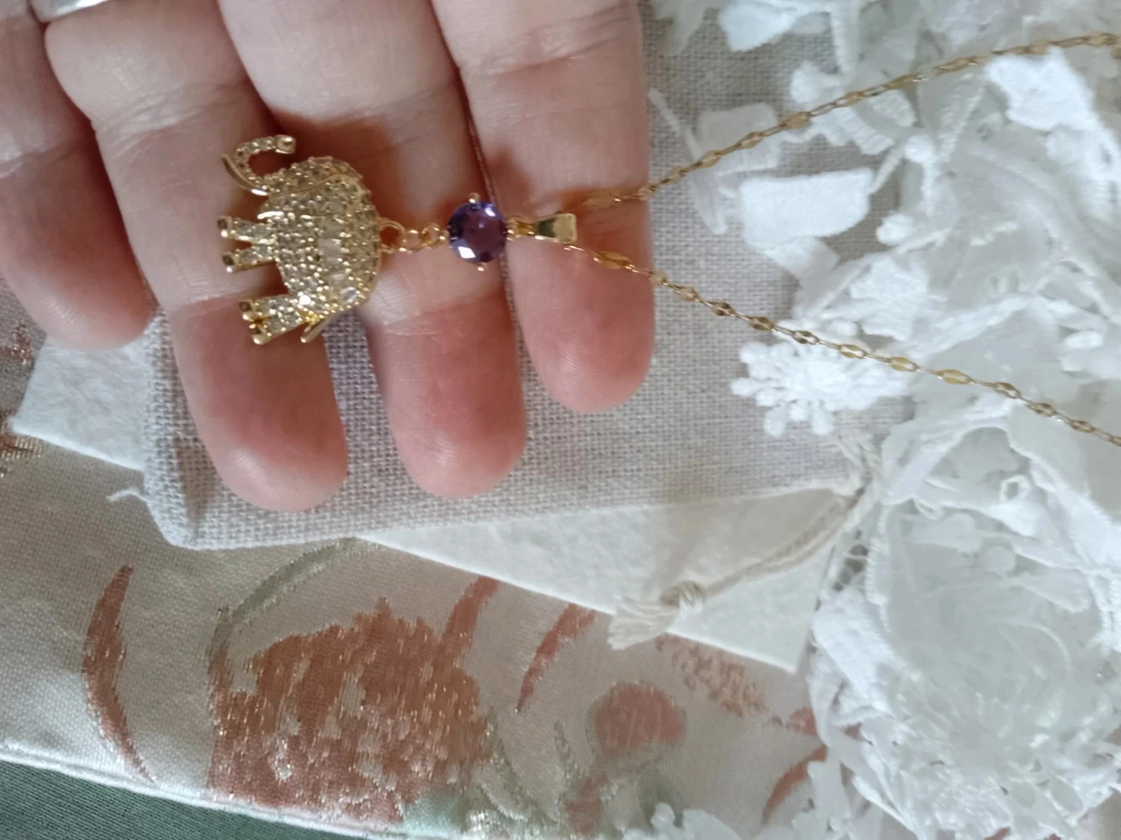 Golden elephant necklace with white eleircons – photo 3